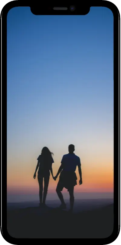 casal de mãos dadas, pôr do sol